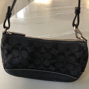 Black Coach Signature bag.